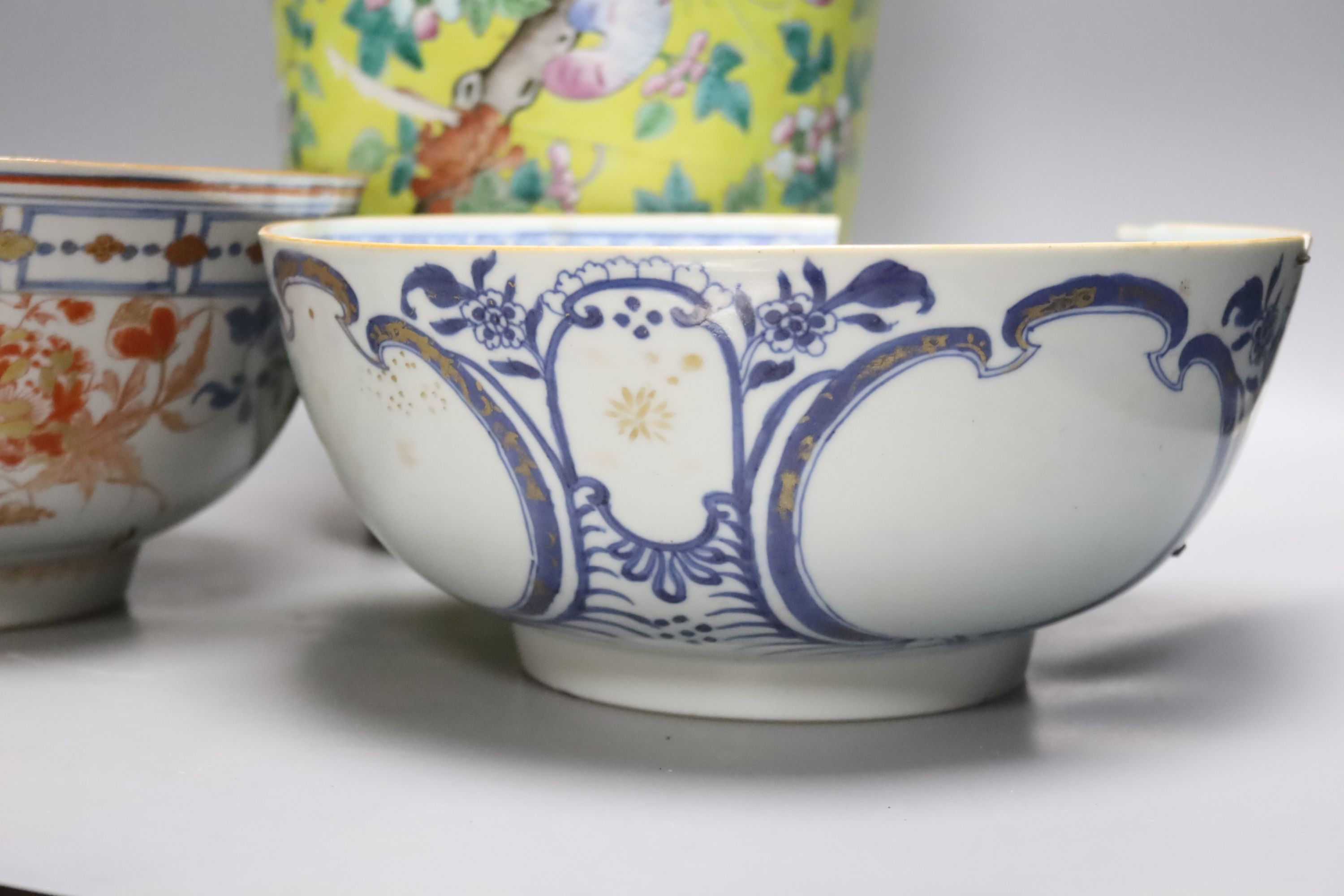 A large 19th century Chinese yellow ground vase and two 18th century Chinese porcelain bowls, diameter 26cm (a.f)